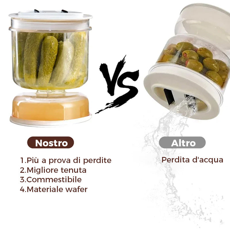 Barattolo di sottaceti e olive con colino