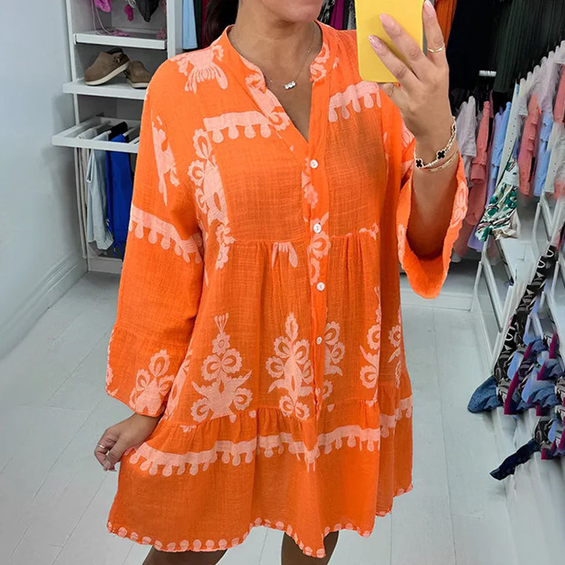 Abito babydoll abbottonato con scollo a V