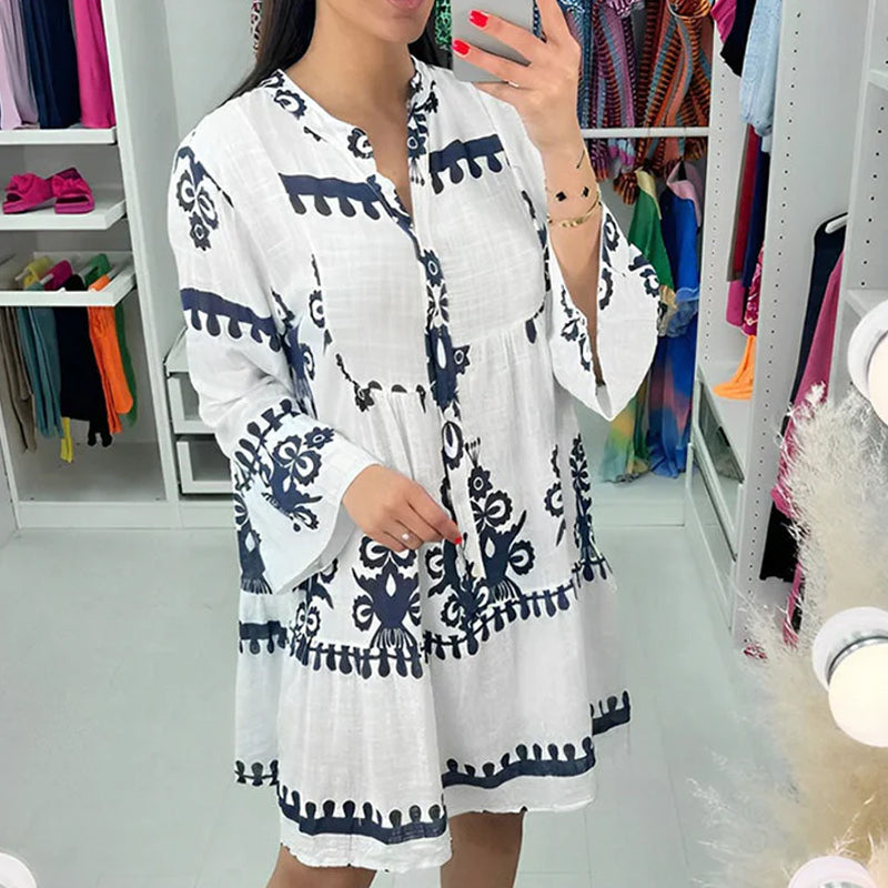 Abito babydoll abbottonato con scollo a V