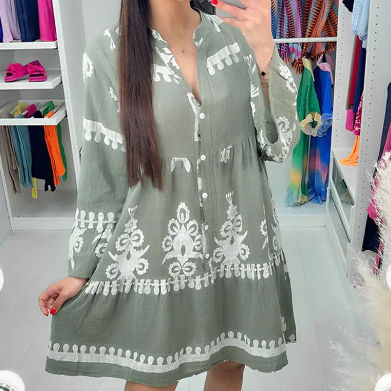Abito babydoll abbottonato con scollo a V