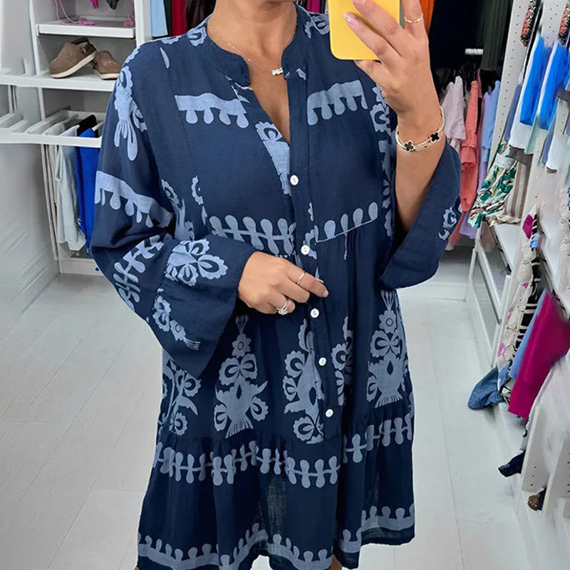 Abito babydoll abbottonato con scollo a V
