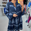 Abito babydoll abbottonato con scollo a V