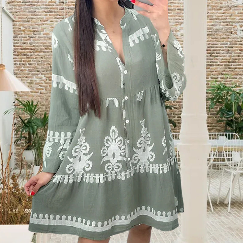 Abito babydoll abbottonato con scollo a V