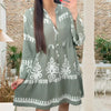 Abito babydoll abbottonato con scollo a V
