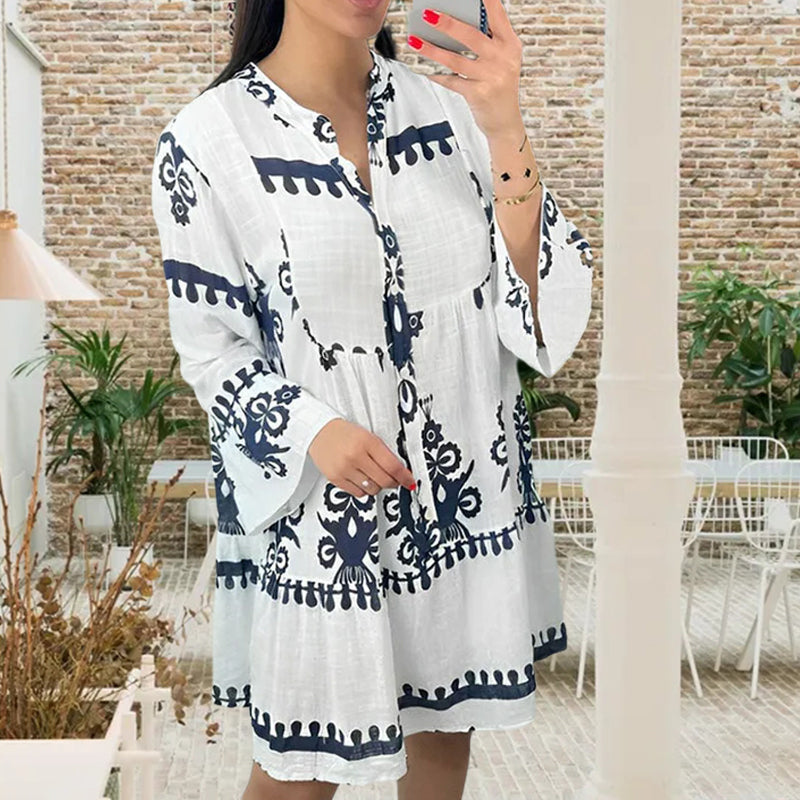 Abito babydoll abbottonato con scollo a V
