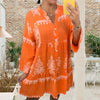 Abito babydoll abbottonato con scollo a V