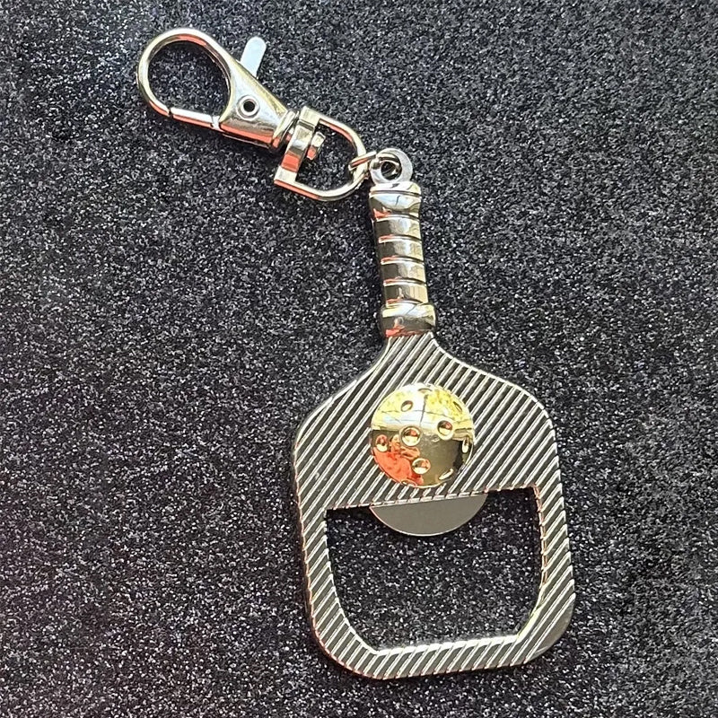 Divertente apribottiglie a paletta