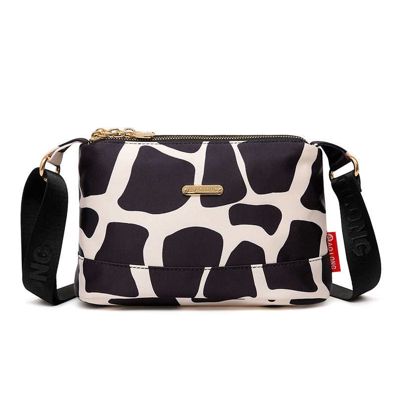 Borsa a tracolla in tela impermeabile