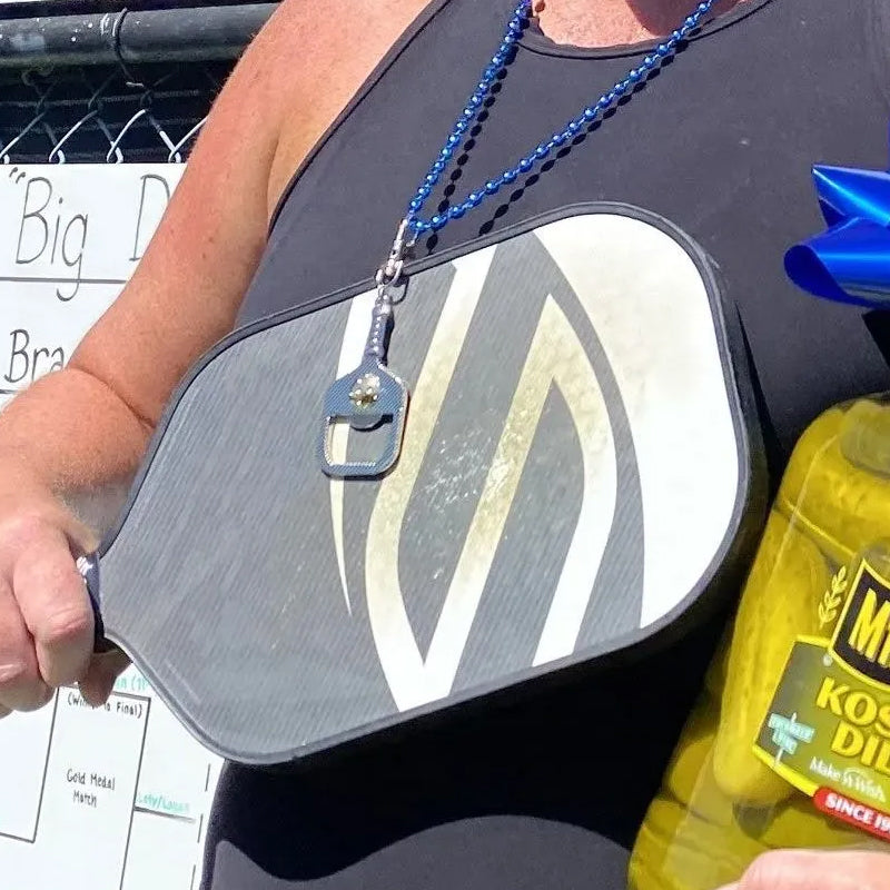 Divertente apribottiglie a paletta