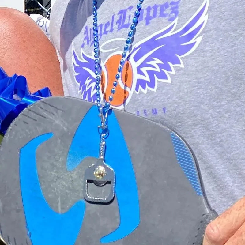 Divertente apribottiglie a paletta