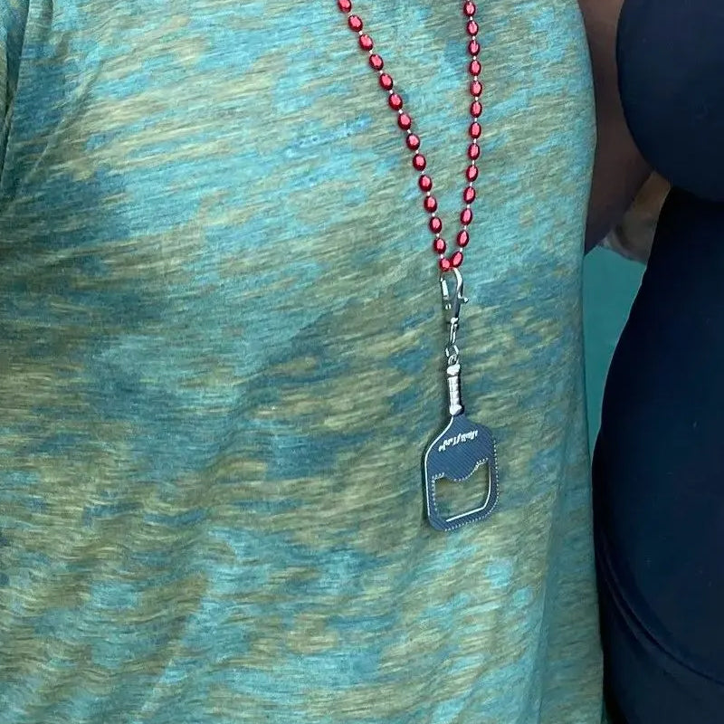 Divertente apribottiglie a paletta