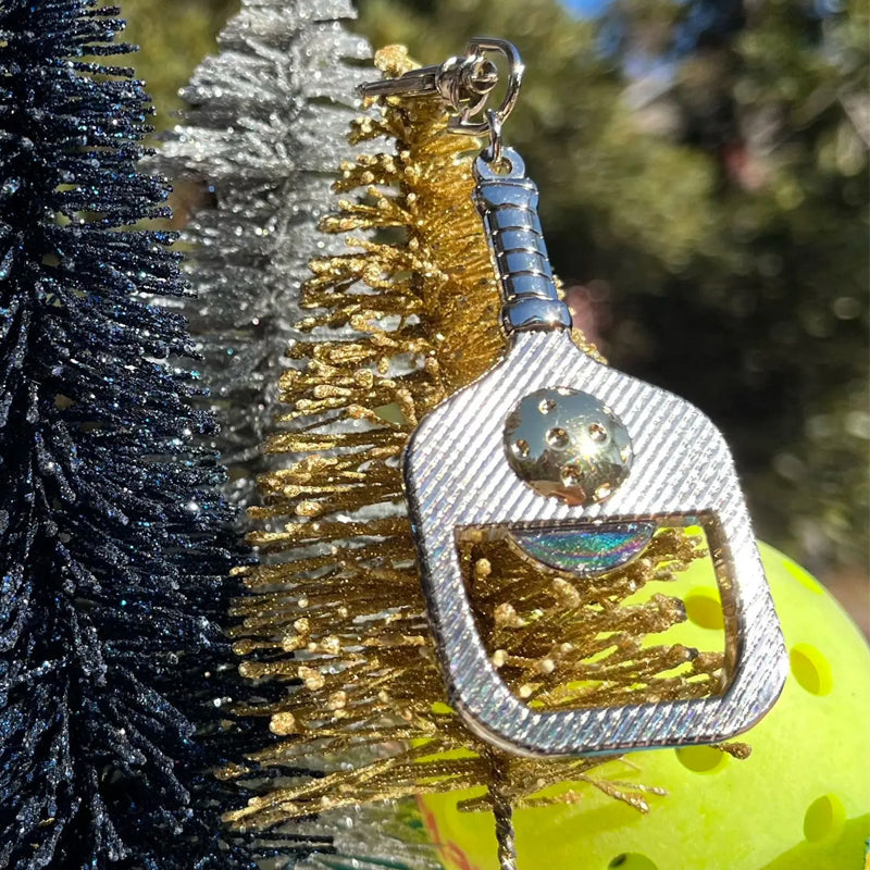 Divertente apribottiglie a paletta