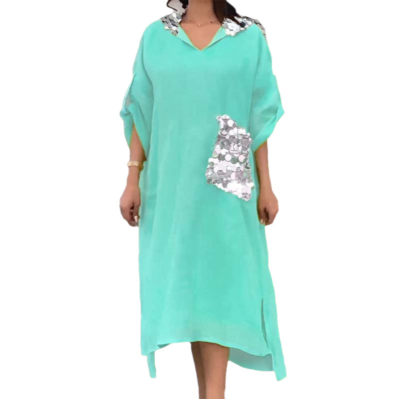 Maxi abito con cappuccio in paillettes a squame di pesce