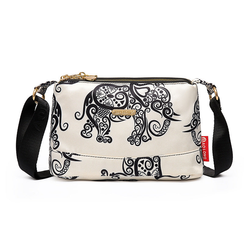 Borsa a tracolla in tela impermeabile