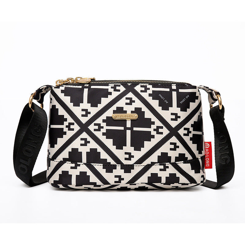 Borsa a tracolla in tela impermeabile