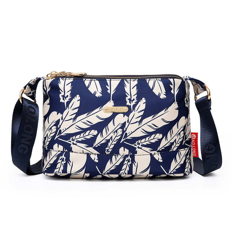 Borsa a tracolla in tela impermeabile