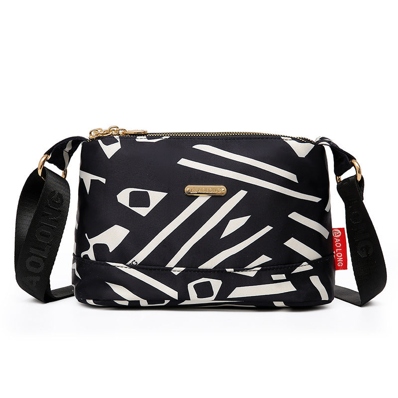 Borsa a tracolla in tela impermeabile