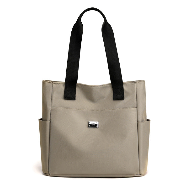 Borsa a tracolla in nylon leggero e impermeabile