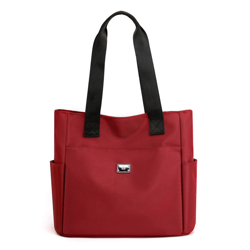 Borsa a tracolla in nylon leggero e impermeabile