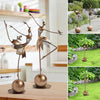 Statue all'aperto della ragazza del giardino di ballo