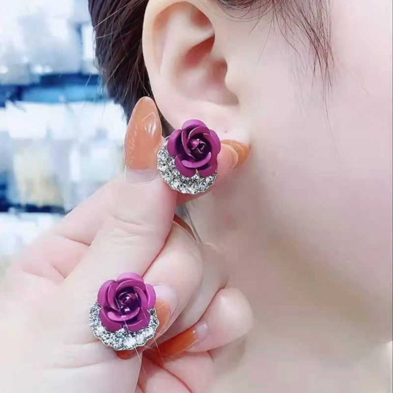 Orecchini a bottone con rosa blu