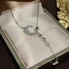 Collana con stella lunare in argento sterling