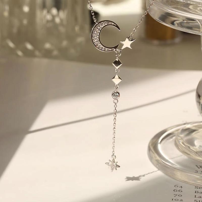 Collana con stella lunare in argento sterling