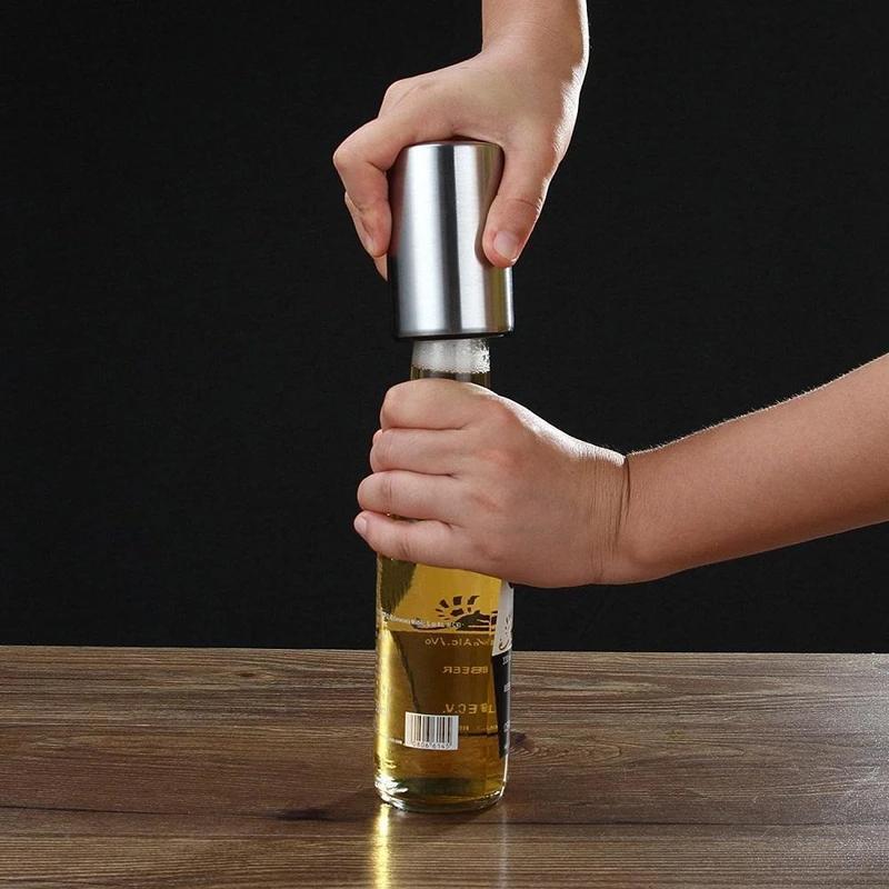 Apribottiglie di birra magnetico-automatico