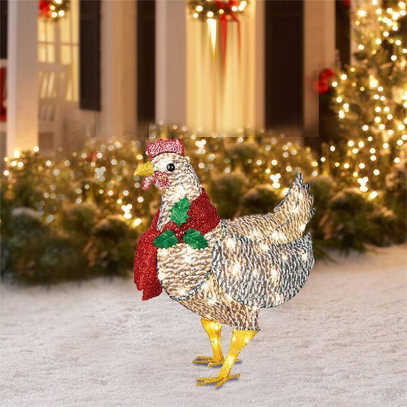 Pollo luminoso con decorazione natalizia sciarpa