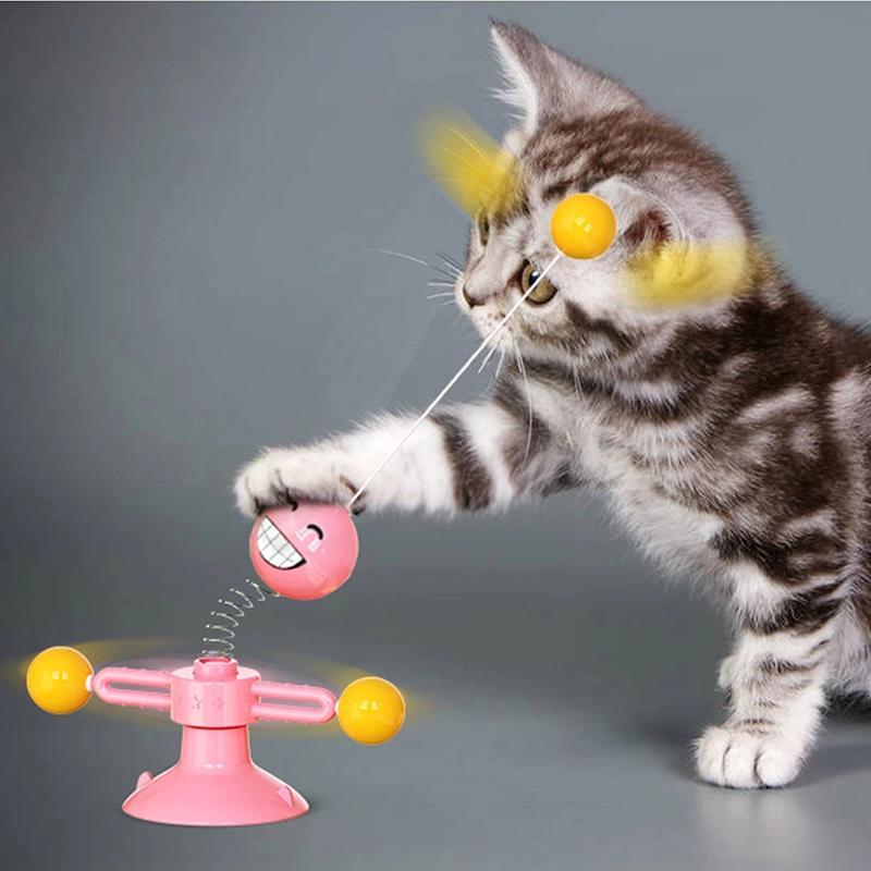 Giocattolo rotante multifunzionale per gatti