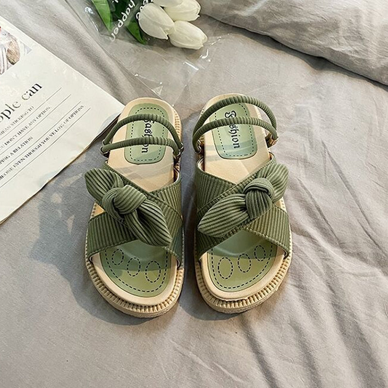 Eleganti sandali con fiocco e suola platform da donna