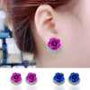 Orecchini a bottone con rosa blu