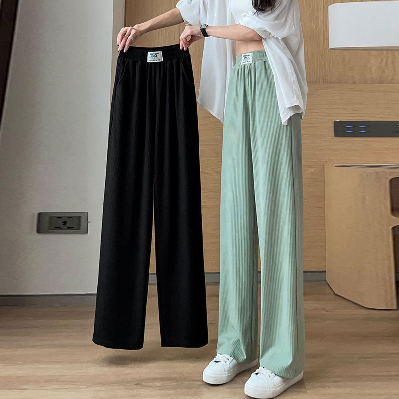 Pantaloni a gamba larga in seta ghiaccio con drappo estivo a vita alta da donna